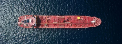 Ammonia bunkering ship-to-ship transfer operation at port terminal with safety equipment and zero-emission maritime fuel infrastructure