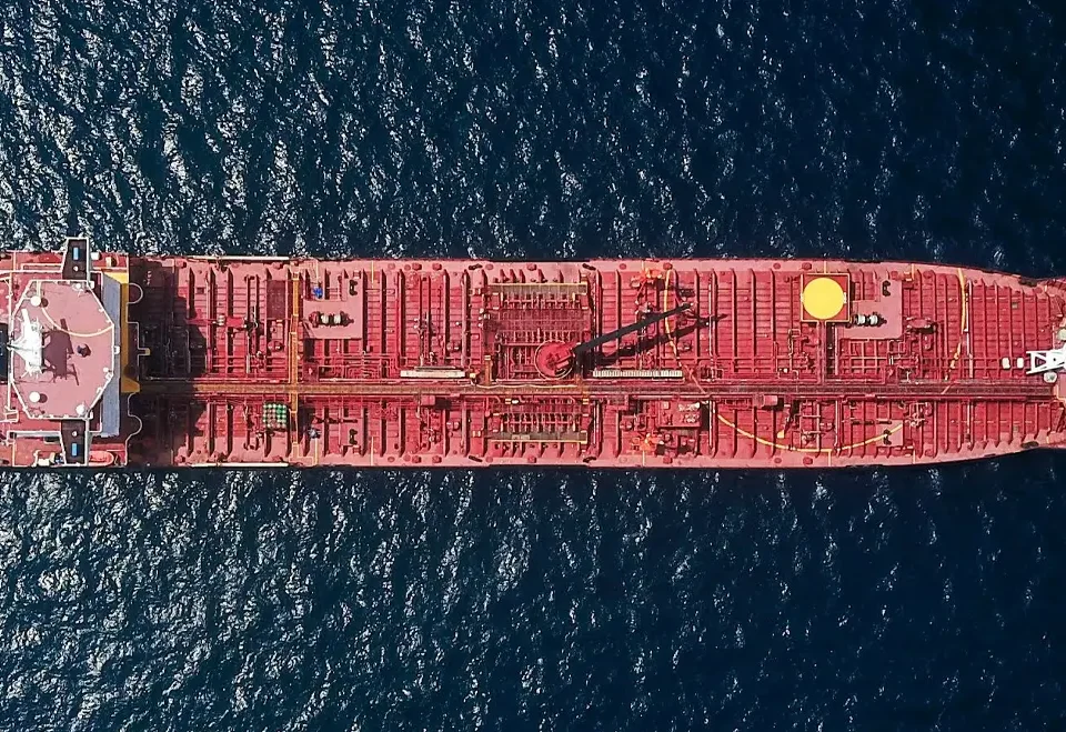 Ammonia bunkering ship-to-ship transfer operation at port terminal with safety equipment and zero-emission maritime fuel infrastructure